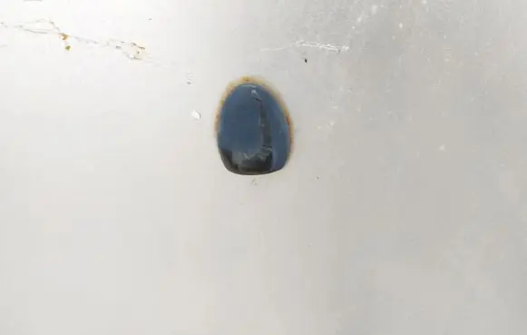 Windshield washer spray nozzle