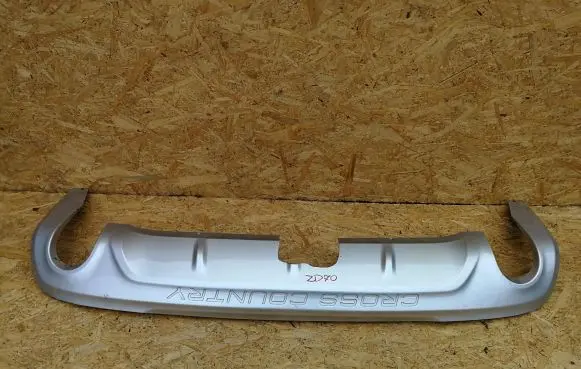 Rear bumper trim bar molding