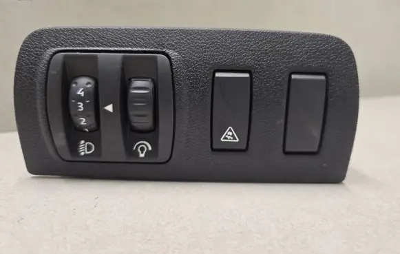 Headlight level height control switch