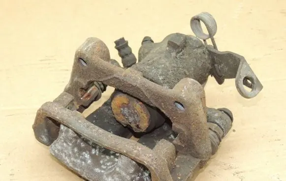 Opel Zafira B Front brake caliper 93176427