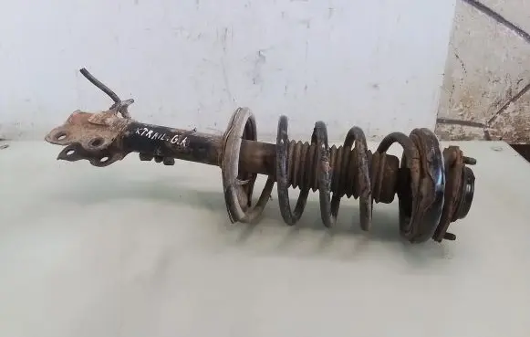 Nissan X-Trail T30 Rear shock absorber with coil spring 