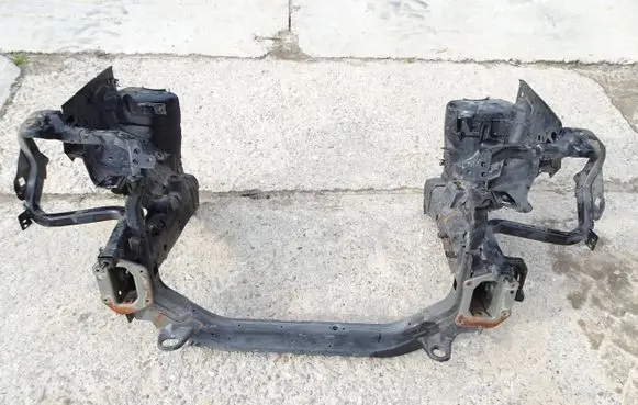 Radiator support slam panel