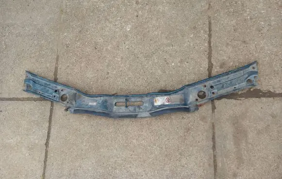 Top upper radiator support slam panel