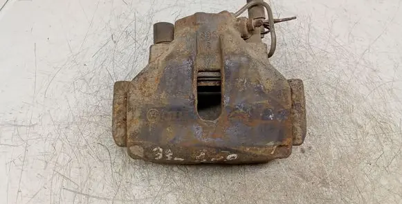 Volkswagen PASSAT B5 Front brake caliper 885