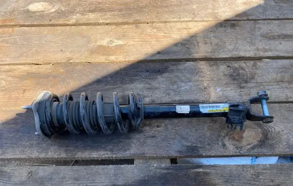 Front shock absorber with coil spring