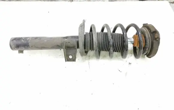 Volkswagen PASSAT B7 Front shock absorber with coil spring