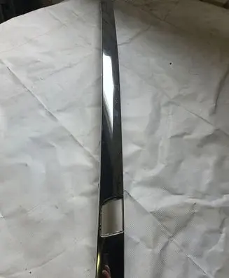 Rear bumper trim bar molding