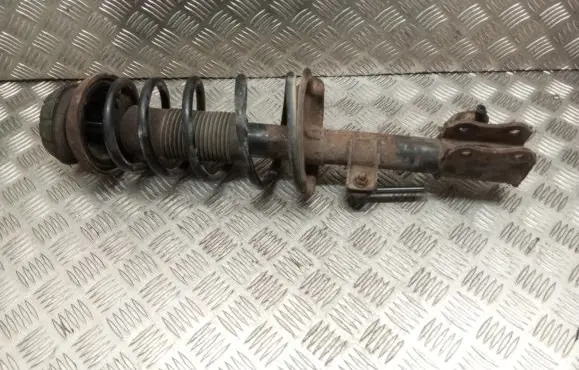 Suzuki Swift I Front shock absorber with coil spring 4160263J11