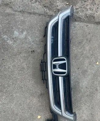 Engine bonnet/hood lock trim molding
