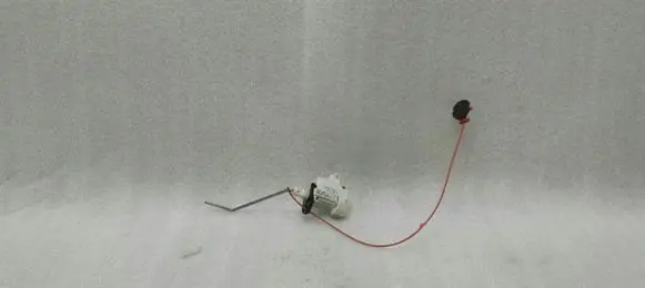 Fuel tank cap lock motor