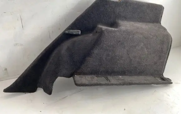 Trunk/boot lower side trim panel