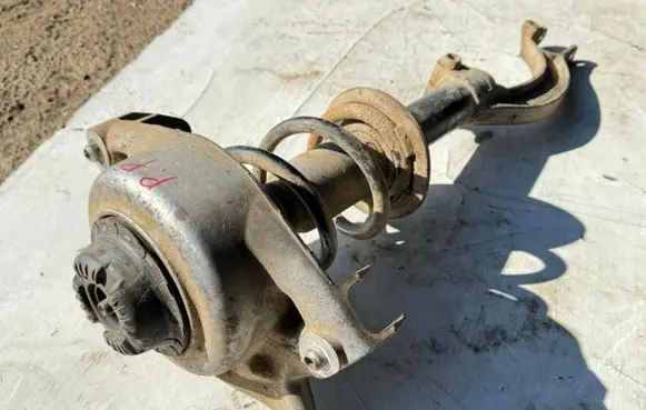 Front shock absorber with coil spring