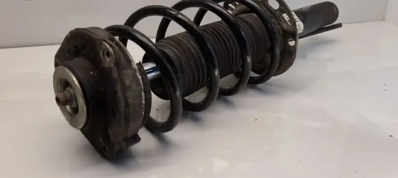 Volkswagen Golf VI Front shock absorber with coil spring 1K0413031