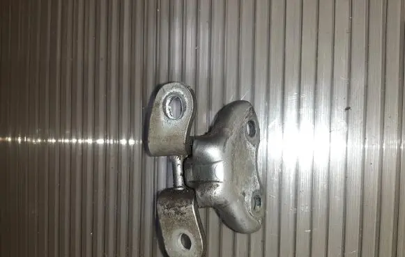 Front door lower hinge