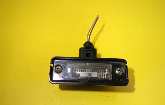 Volkswagen Golf IV Number plate light 1J6943021