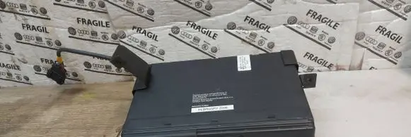 Volkswagen Touareg I CD/DVD changer 1J6035111