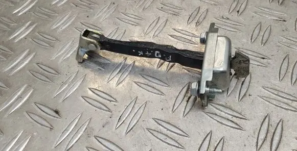Front door check strap stopper