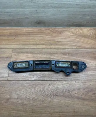 Volkswagen Jetta V Trunk door license plate light bar 1T0827574B