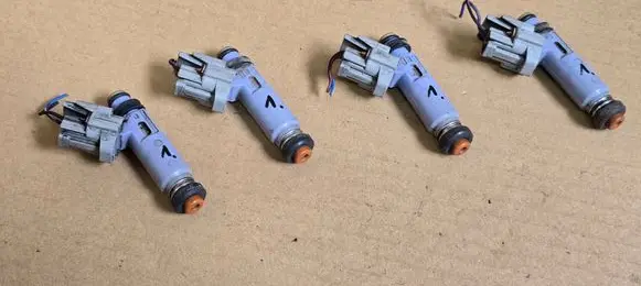 Suzuki Ignis Fuel injectors set 1571080G00 1571080G01