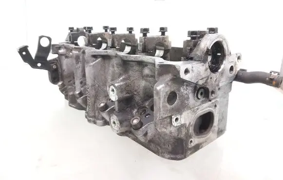 Volkswagen Golf IV Engine head 038103373E