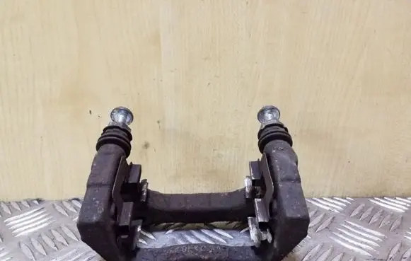 Opel Astra H Brake caliper pad carrier rear 