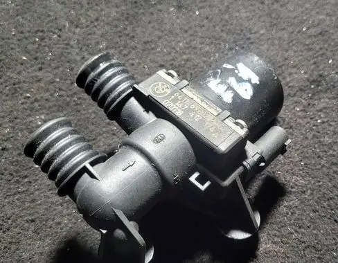 Coolant heater control valve