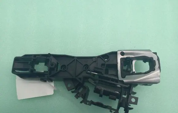 Rear door exterior handle/bracket