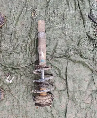 BMW 5 E39 Front shock absorber with coil spring 31311093644