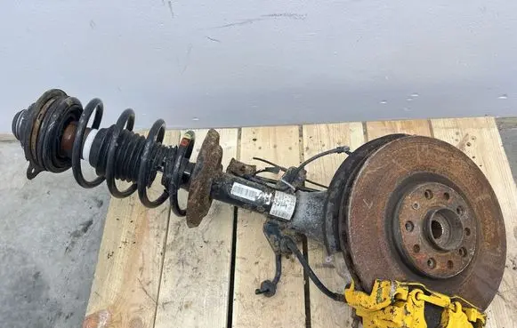 Alfa Romeo Giulietta Front shock absorber with coil spring 