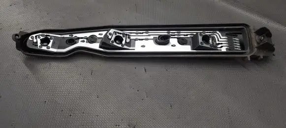 Opel Corsa C Tail light bulb cover holder