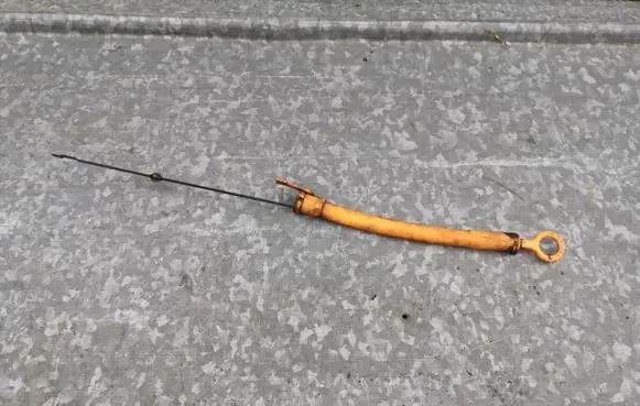Oil level dip stick