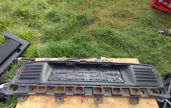Rear bumper trim bar molding