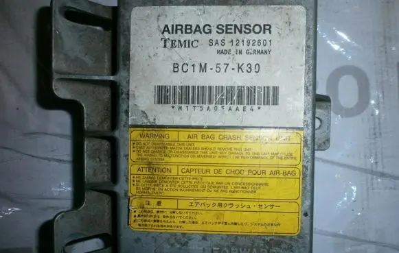 Mazda 323 Airbag control unit/module BC1M57K30 12192601