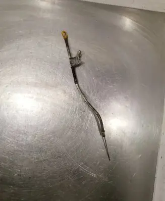 Oil level dip stick