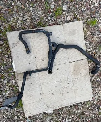 Volkswagen Golf VII Engine coolant pipe/hose 5Q0122051AR