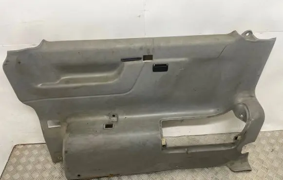 Volkswagen Multivan T4 Trunk/boot side trim panel 705867036
