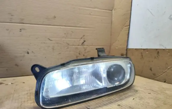 Mazda 323 F Headlight/headlamp 1305623022