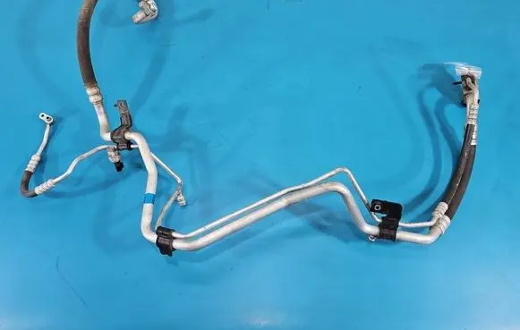 KIA Sportage Air conditioning (A/C) pipe/hose 977753U000 IMPRK1546468