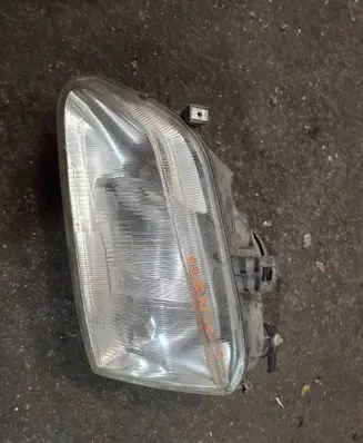 Renault Scenic I Headlight/headlamp 7701672734