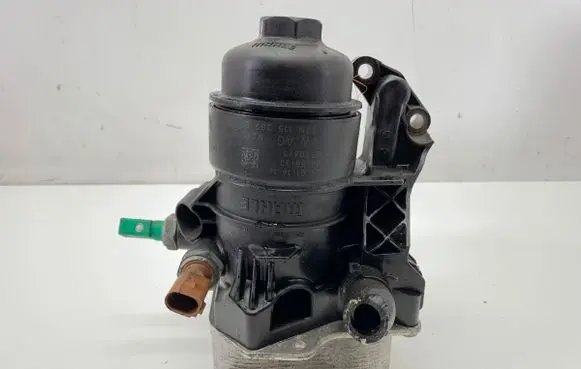 Volkswagen Golf VII Oil filter mounting bracket 03N115389B