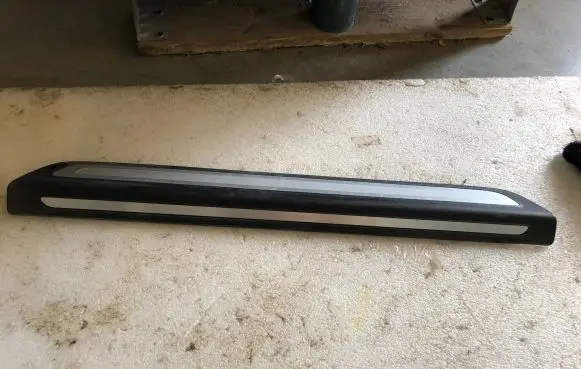 Front sill trim cover