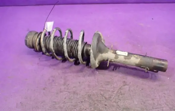 Volkswagen Golf IV Front shock absorber with coil spring 1J0413031S
