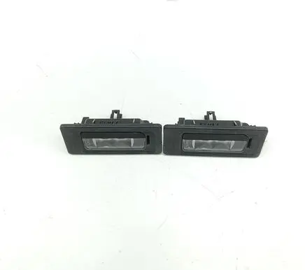 Volkswagen Touareg II Number plate light 3AF943021A