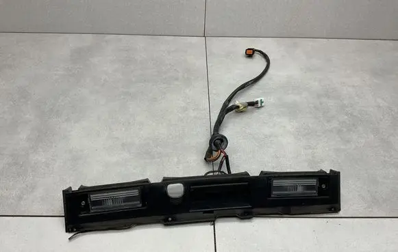 Hyundai Tucson TL Trunk door license plate light bar 