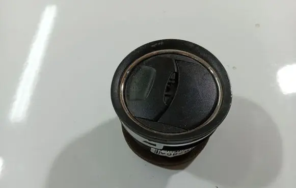 Dash center air vent grill
