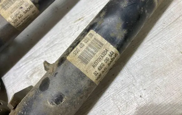 Front shock absorber with coil spring