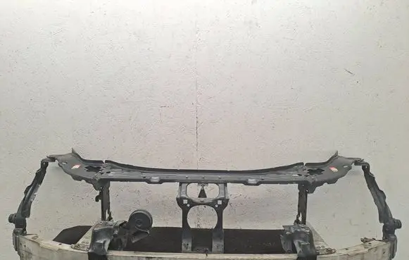 Radiator support slam panel