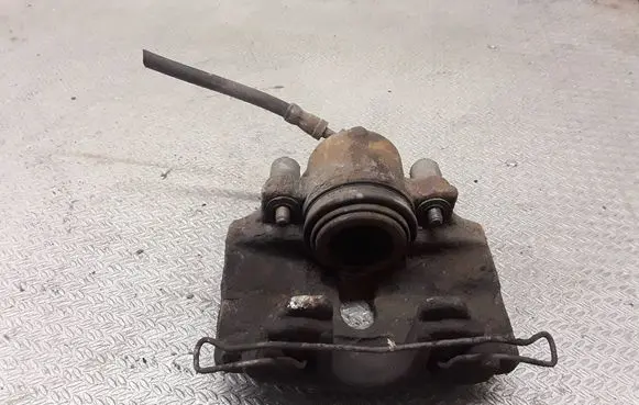 Volkswagen Golf V Front brake caliper 