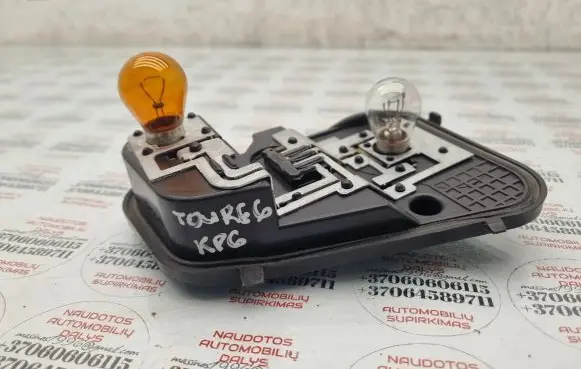 Volkswagen Touareg I Tail light bulb cover holder 7L6945257