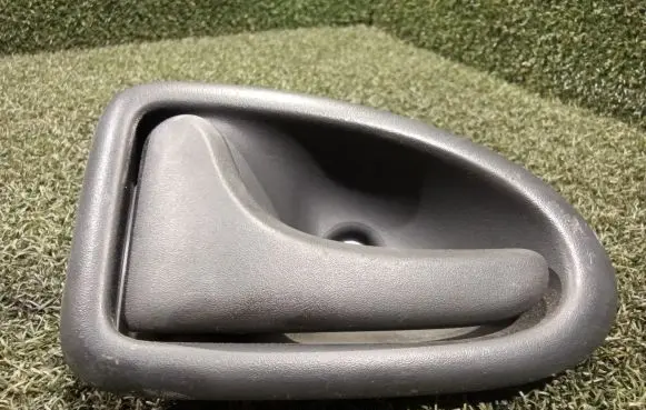Opel Vivaro Front door interior handle 7700423887